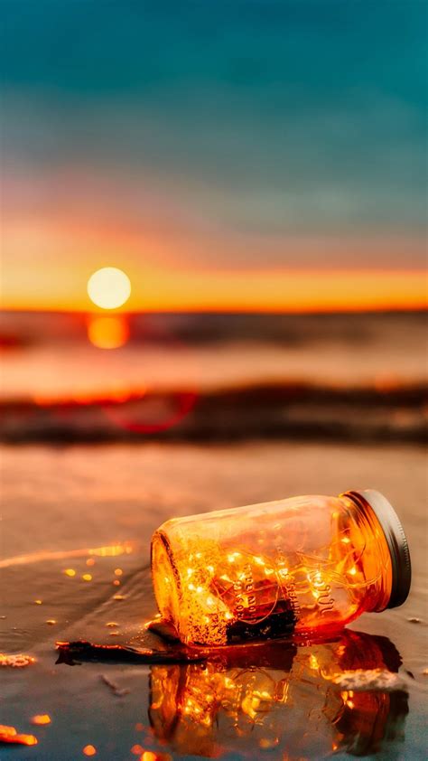 Bottle Lights Sunset Beach Iphone Wallpaper