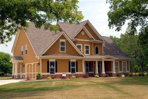 That flush beige for the sides and a sunny white on the rails and about the windows always looks great. Exterior House Paint Colors for Your Home - Amaza Design