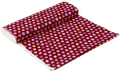 Red Dobby Fabric From Japan With Brightly Coloured Rows Of Flowers By