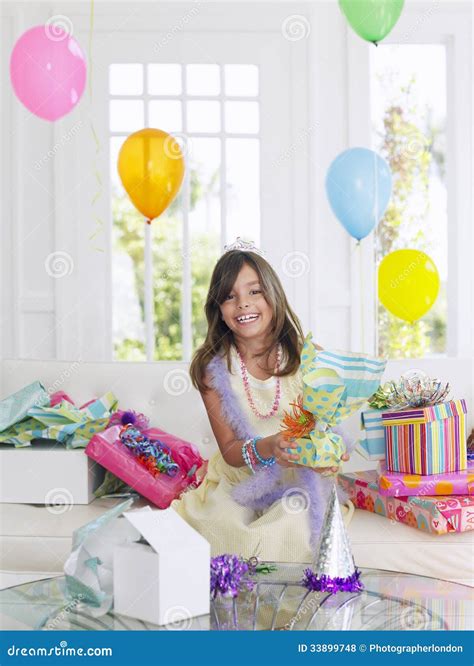 Girl Opening Birthday Presents Stock Photo Image Of Leisure Looking
