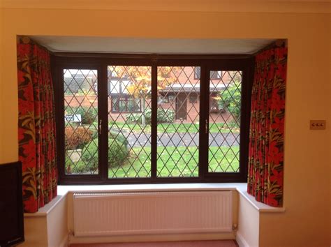 How To Put Curtains In A Square Bay Window Windowcurtain