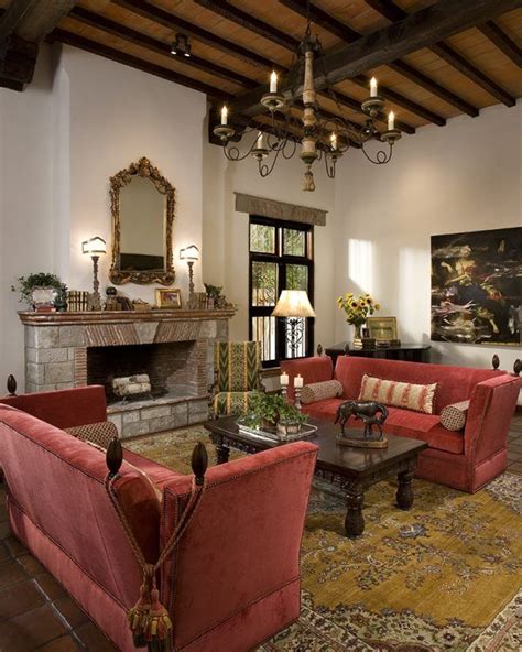 A Living Room Filled With Red Couches Next To A Fire Place And A