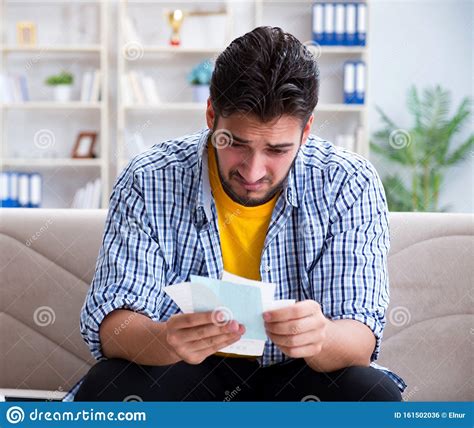 Man Angry At Bills He Needs To Pay Stock Photo Image Of Concerned