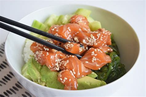A recipe for a low FODMAP poké bowl with salmon Fresh raw salmon in