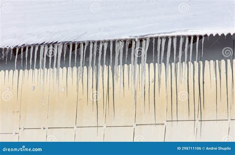Icicles Hang From The Roof Of The House Winter Stock Photo Image Of
