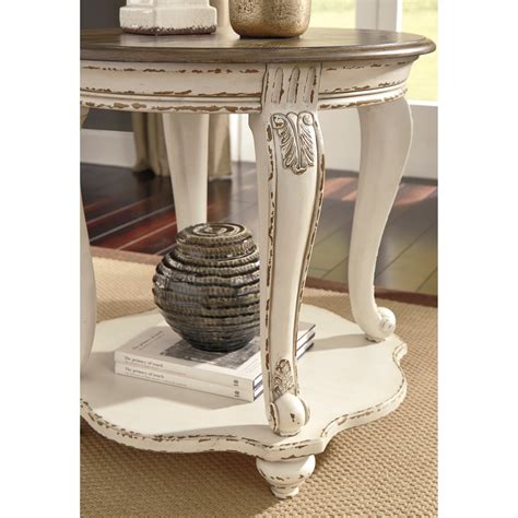Realyn coffee table with 2 end tables. Signature Design by Ashley Realyn Two-Tone Round End Table ...