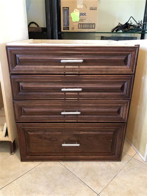 You may find some used kitchen cabinets for sale listed primarily on craigslist and sometimes on ebay. Solid wood kitchen cabinets, high quality - 21 pieces ...