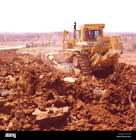 Caterpillar D10 Bulldozer At A Construction Site Clearing Ground For A