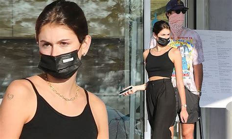 Kaia Gerber Flashes Toned Tummy In Cropped Top On Lunch Outing With