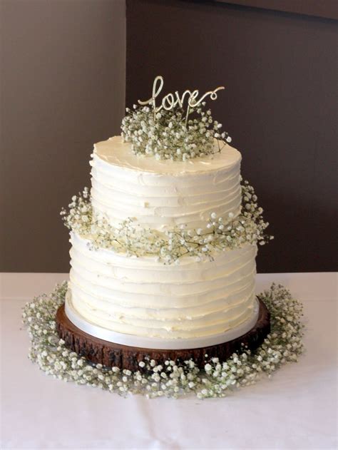 Adding succulents to your wedding cake design makes for a stunning statement no matter your style. 2 tier rustic buttercream | Wedding cake decorations ...