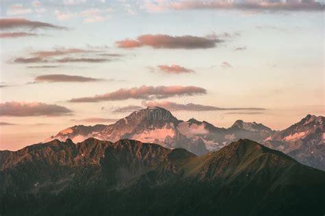 Sunset Rocky Mountains Peaks Range And Clouds Landscape Stock Photo