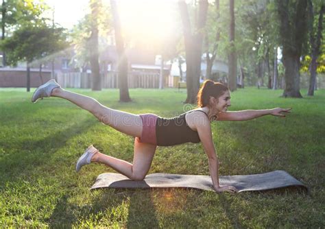 Stretching Woman In Outdoor Exercise Smiling Happy Doing Stretch Stock