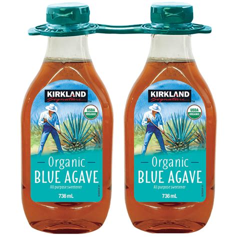 Two Bottles Of Blue Agave On A White Background