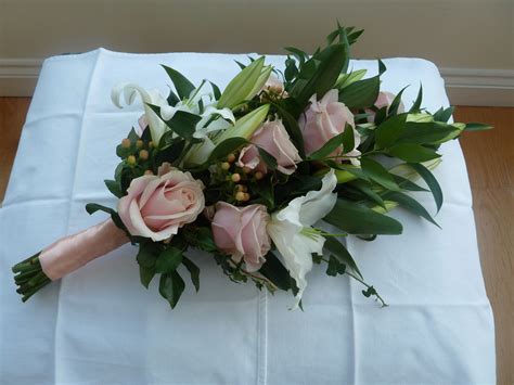 Over The Arm Wedding Bouquet Sweet Avalanche Roses Lilies Ruscus