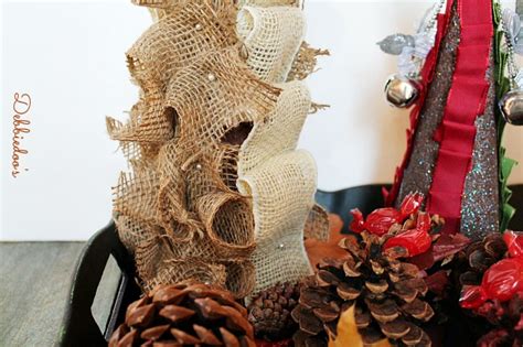 Maybe you would like to learn more about one of these? Burlap bells and Ribbon Christmas cone trees - Debbiedoos