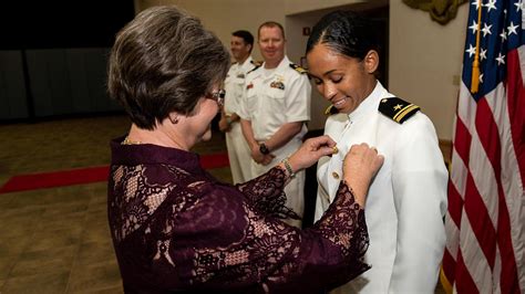 us navy s first black female tactical jet pilot gets her wings of gold cnn
