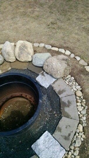 Diy Natural Rock Fire Pit With Tractor Rim Center To Protect Flames