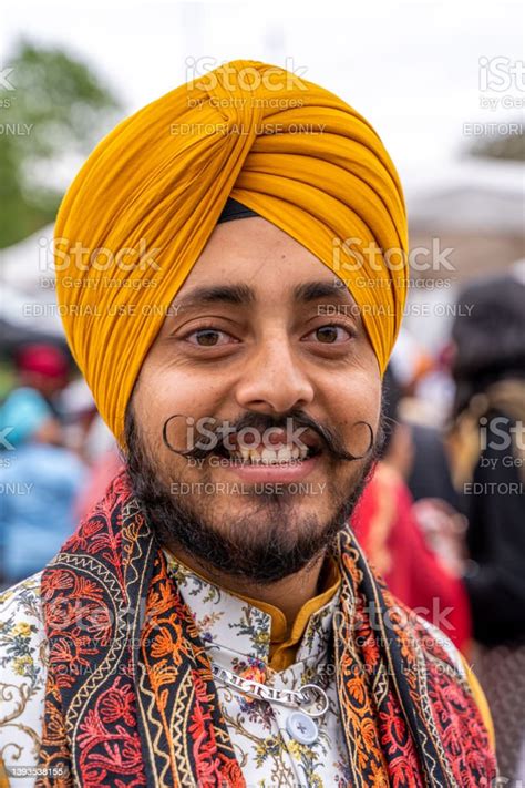 Young Man Of The Sikh Religion In Procession With Traditional Clothes