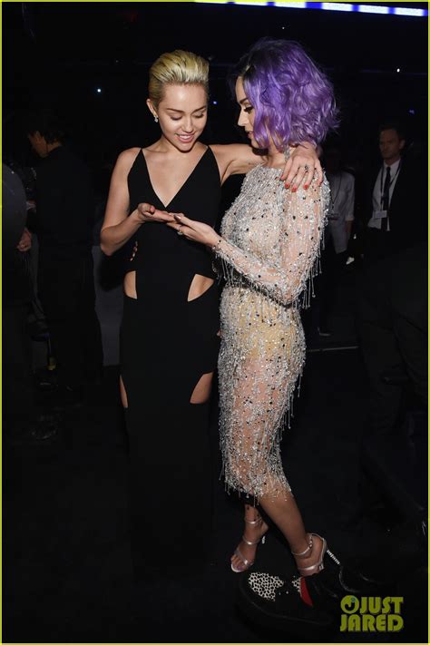Miley Cyrus Cups Katy Perrys Boob At Grammys 2015 Photos Photo