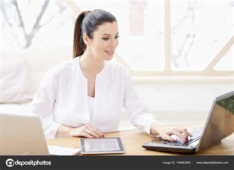 Find the perfect women sitting at desk stock photos and editorial news pictures from getty images. Beautiful Young Woman Sitting Office Desk Computers ...
