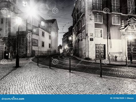 Night Street In Lisbon The Capital Of Portugal At Sunset A Pop Stock