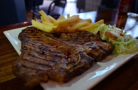 T Bone Steak Served With Chips Salad N Sauce Picture Of Flamin Steak
