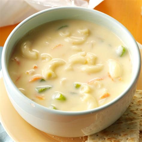 Continue to cook the soup on low heat and slowly add the grated cheese a handful at a time and stir to avoid clumps. Macaroni and Cheese Soup Recipe | Taste of Home