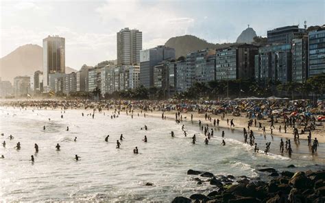 Crowded Copacabana Beach With Distant View Of Christ The Redeemer