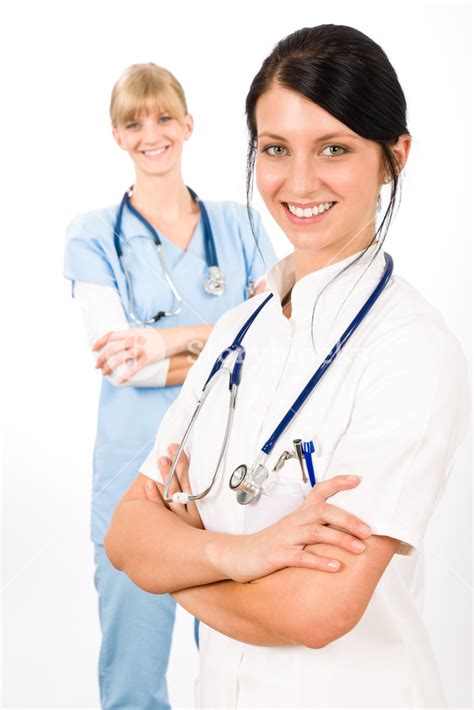 Medical Team Doctor Young Nurse Female Smiling Look At Camera Royalty