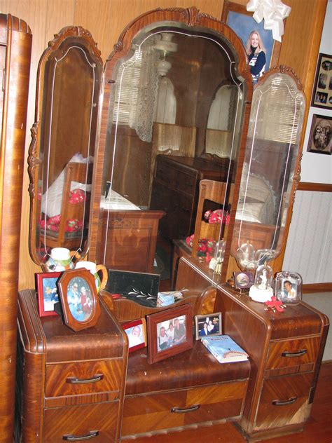 There were missing legs, the veneer was in horrible shape. Matching waterfall 1930's vanity. Has water damage on ...