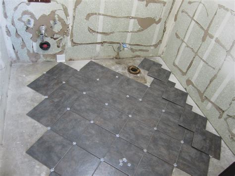 Installing a tile floor in any of these rooms will when tiling a floor, draw a layout of your finished tile design directly onto your subfloor. Bathroom Upgrade Part II « Enegren Brewing Blog