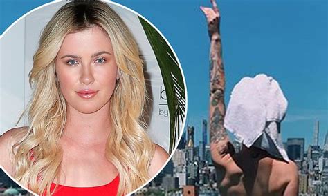 Ireland Baldwin Poses Topless In A Nude Colored Thong While She Looks