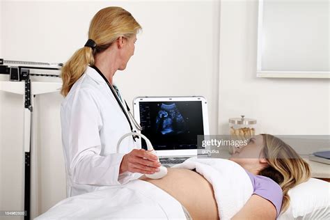 Doctor Performing Ultrasound High Res Stock Photo Getty Images