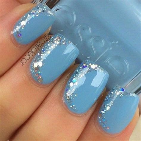 Pale Blue Nail Art Design With Glitter And Beads On Top Blue And