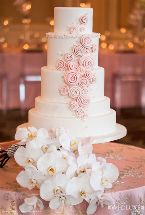 The blush flowers that top this lemon marionberry cake. 2014 Blush Pink Weddings Archives - Weddings Romantique