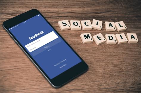 Download Social Media Facebook On Phone Wallpaper