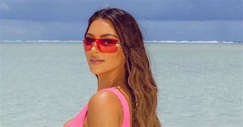 Kim Kardashian Frolics On The Beach In Tiny Pink Bikini Photos My Xxx Hot Girl