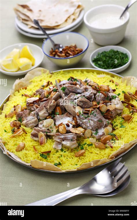 Mansaf Is A Traditional Arab Dish Made Of Lamb Cooked In A Sauce Of