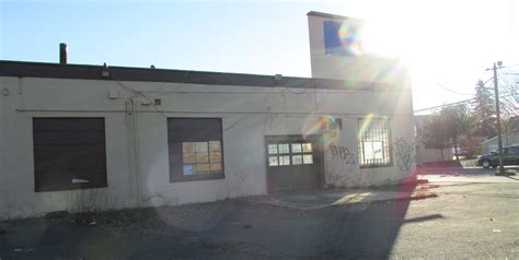 19 Eerie Pictures Of Abandoned Car Dealerships Around The World