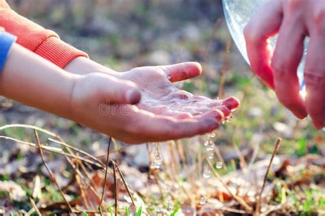 11 min tap thumbnail to download! A Small Boy Washes His Hands On A Picnic With His Mother ...