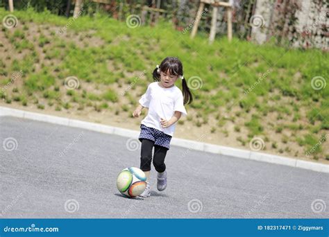 Japanese Girl Dribbling Soccer Ball Stock Image Image Of Smile