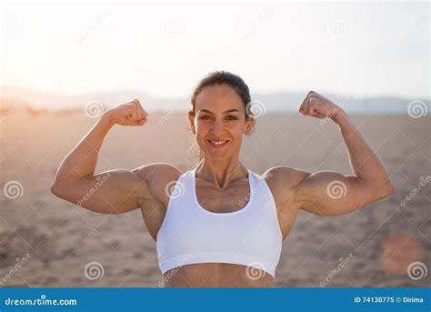 Strong Fitness Woman Flexing Biceps On Sunset Stock Image Image Of
