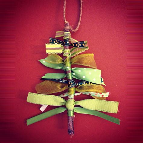 Diy Christmas Tree Ornament Made With Ribbons And A Twig Diy