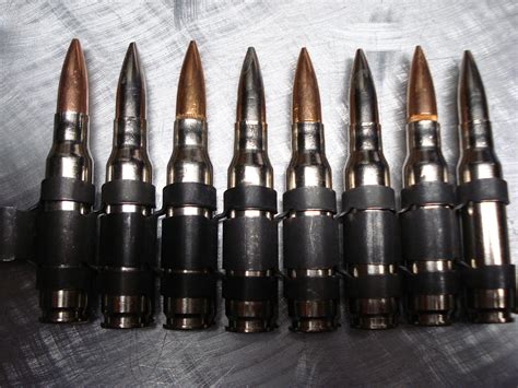 m60 bullet strip of 7 copper tip and full nickle black link black death 011 metal devastation