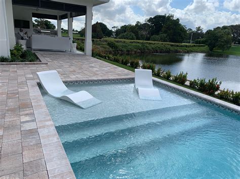 Aqua Chairs In Pool Chaise Loungers Arrive In Delray Beach Fl Year Round Enjoyment On Your