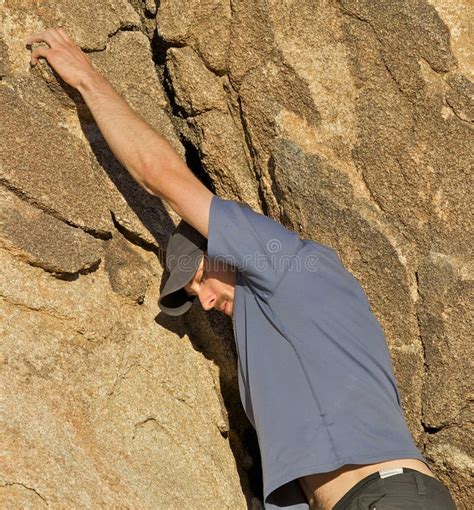 Man Climbing A Rock Wall Stock Photo Image Of Climber 4629492
