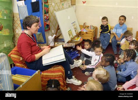 Nursery School Teacher Taking A Role Call In Class Stock Photo Alamy