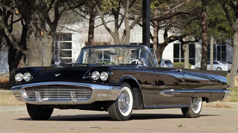Chocolate brown with a white top and off white interior. 1959 Ford Thunderbird Convertible | S43.1 | Houston 2021