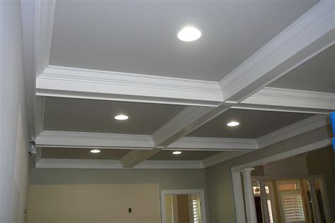 A coffered ceiling is, essentially, several recessed boxes in the ceiling to give detail and texture to a, normally, ordinary ceiling. Coffered ceiling in kitchen | Coffered ceiling, Ceiling ...