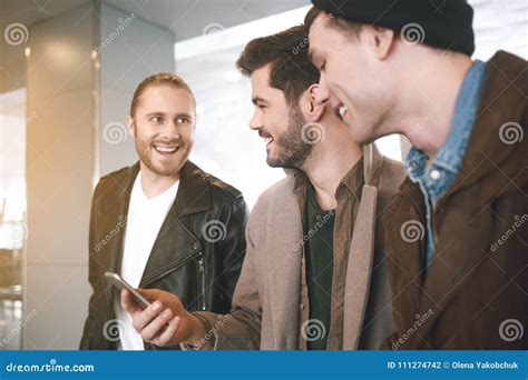 Cheerful Male Comrades Speaking Together Stock Photo Image Of